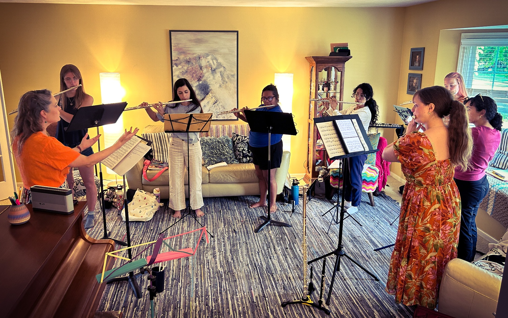 Abigail Walsh directing a group of flutists during a Flute Intensive Session.